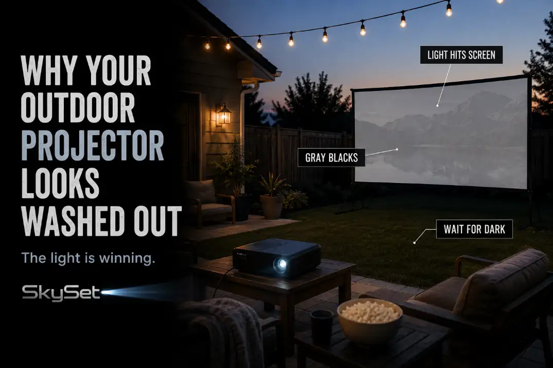 Outdoor projector screen looking washed out because patio light and dusk brightness are hitting the screen before full darkness.