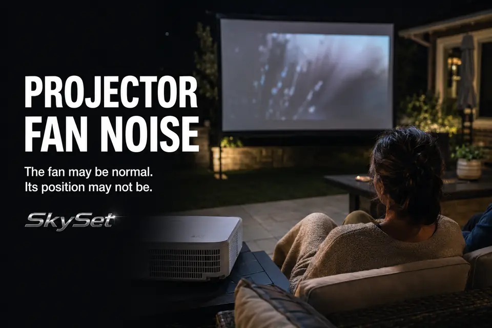 Outdoor projector positioned close to backyard movie seating where its fan can distract nearby viewers.
